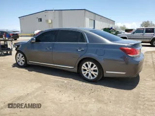 2011 Toyota Avalon with VIN 4T1BK3DB1BU425430, listed as a Copart auction lot 62591215 with 174,078 mi miles and Salvage title. Bid and sale history available at DreamBid. Image 2.