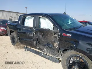 2021 Chevrolet Silverado 1500 LT Trail Boss with VIN 3GCPYFED4MG473147, listed as a IAAI auction lot 41466515 with 92,852 mi miles and . Bid and sale history available at DreamBid. Image 6.