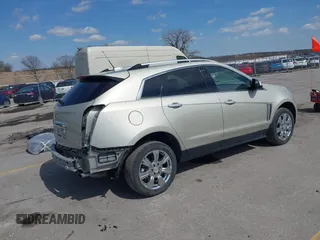2015 Cadillac SRX Luxury Collection with VIN 3GYFNEE32FS638242, listed as a IAAI auction lot 41866683 with 32,277 mi miles. Bid and sale history available at carsss.com. Image 4.