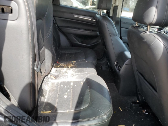 2018 Mazda CX-5 Grand Touring z VIN JM3KFADM2J1381752, wystawiony jako Copart lot #56889835 z przebiegiem 96 820 mil mil oraz Szkoda całkowita • Salvage title. Historia ofert i sprzedaży dostępna na DreamBid. Obrazek 10.
