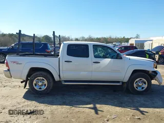 2009 Toyota Tacoma PreRunner with VIN 3TMJU62N79M078810, listed as a IAAI auction lot 41358051 with 154,001 mi miles. Bid and sale history available at carsss.com. Image 13.