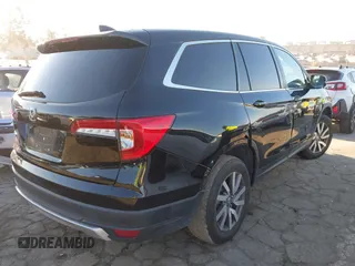 2021 Honda Pilot EX-L with VIN 5FNYF5H51MB004516, listed as a IAAI auction lot 41759992 with 75,476 mi miles. Bid and sale history available at carsss.com. Image 4.