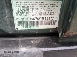2000 Honda Civic LX with VIN 2HGEJ6676YH512977, listed as a Copart auction lot 50985455 with 242,759 mi miles and Salvage Title. Bid and sale history available at DreamBid. Image 12.