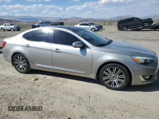 2014 Kia Cadenza Premium with VIN KNALN4D73E5137275, listed as a Copart auction lot 68643614 with 115,020 mi miles and Salvage Title. Bid and sale history available at carsss.com. Image 4.