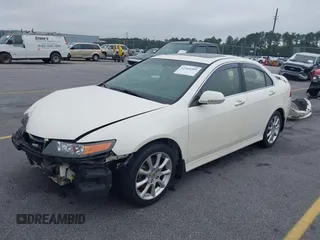 2007 Acura TSX with VIN JH4CL96817C004877, listed as a IAAI auction lot 42464309 with 299,459 mi miles and . Bid and sale history available at DreamBid. Image 2.