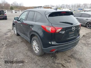 2016 Mazda CX-5 Touring with VIN JM3KE4CY4G0738713, listed as a IAAI auction lot 41998597 with 146,595 mi miles and . Bid and sale history available at carsss.com. Image 3.