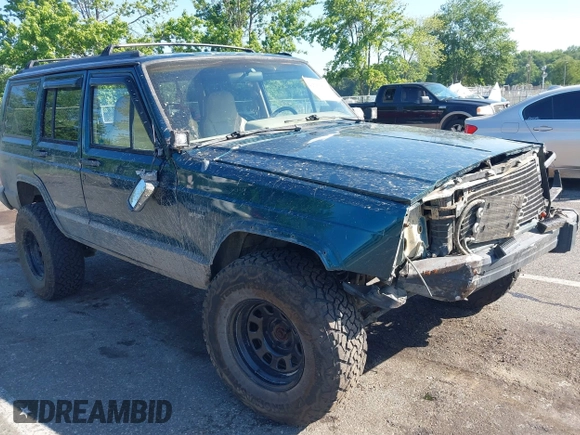 1995 Jeep Cherokee Sport z VIN 1J4FJ68S7SL623451, wystawiony jako IAAI lot #42581407 z przebiegiem 160 581 mil mil oraz . Historia ofert i sprzedaży dostępna na DreamBid. Obrazek 1.
