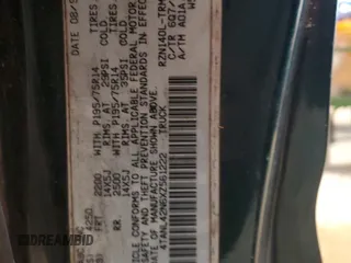 1999 Toyota Tacoma z VIN 4TANL42N6XZ561222, wystawiony jako Copart lot #45721925 z przebiegiem 221 521 mil mil oraz Szkoda całkowita • Salvage title. Historia ofert i sprzedaży dostępna na DreamBid. Obrazek 12.