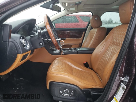 2017 Jaguar XJ with VIN SAJWJ2GD9H8W04365, listed as a Copart auction lot 38997744 with 73,569 mi miles. Bid and sale history available at carsss.com. Image 7.
