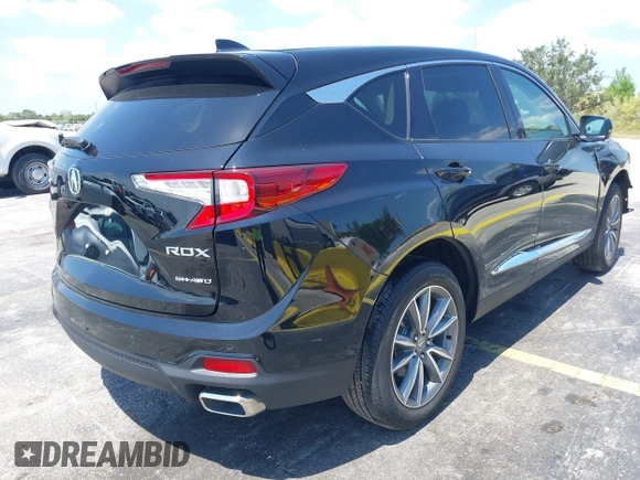 2023 Acura RDX Technology with VIN 5J8TC2H53PL000181, listed as a IAAI auction lot 42308339 with 10,630 mi miles and . Bid and sale history available at DreamBid. Image 4.