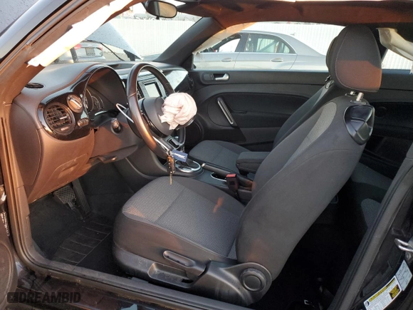 2019 Volkswagen Beetle S with VIN 3VWFD7AT3KM710863, listed as a Copart auction lot 79176004 with 0 mi miles and Salvage Title. Bid and sale history available at carsss.com. Image 7.