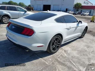 2021 Ford Mustang EcoBoost with VIN 1FA6P8TH6M5115299, listed as a IAAI auction lot 41972638 with 43,188 mi miles. Bid and sale history available at carsss.com. Image 4.