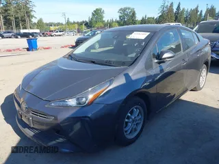 2022 Toyota Prius L Eco with VIN JTDKAMFU0N3173997, listed as a IAAI auction lot 42182489 with 41,220 mi miles and . Bid and sale history available at DreamBid. Image 18.