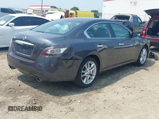 2013 Nissan Maxima SV with VIN 1N4AA5AP4DC823356, listed as a IAAI auction lot 42386580 with 126,717 mi miles and . Bid and sale history available at DreamBid. Image 4.