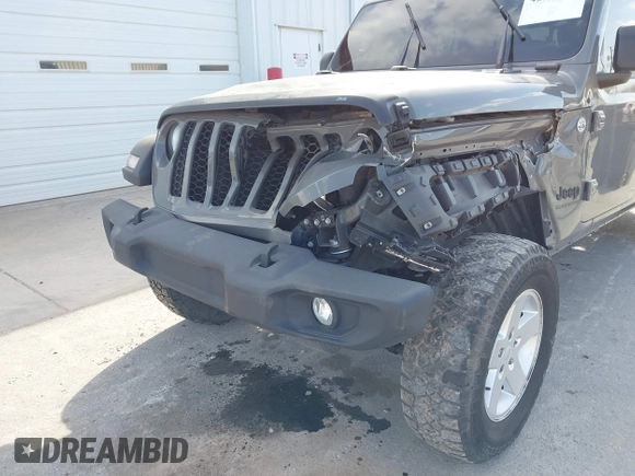 2020 Jeep Gladiator Sport S z VIN 1C6HJTAG7LL154664, wystawiony jako IAAI lot #42033131 z przebiegiem 73 282 mil mil oraz . Historia ofert i sprzedaży dostępna na DreamBid. Obrazek 6.