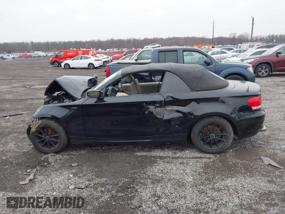 2011 BMW 1 Series 128i with VIN WBAUN1C5XBVH82457, listed as a IAAI auction lot 41173785 with Not provided miles and . Bid and sale history available at DreamBid. Image 14.