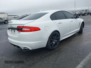 2015 Jaguar XF V6 Portfolio with VIN SAJWA0F70F8U62534, listed as a IAAI auction lot 41521097 with 112,117 mi miles. Bid and sale history available at carsss.com. Image 4.