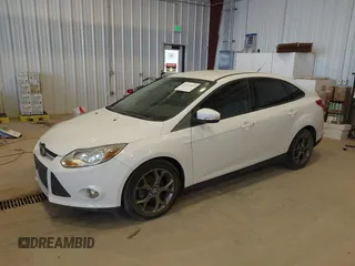 2013 Ford Focus SE z VIN 1FADP3F2XDL255868, wystawiony jako IAAI lot #42267492 z przebiegiem 144 640 mil mil oraz . Historia ofert i sprzedaży dostępna na DreamBid. Obrazek 2.