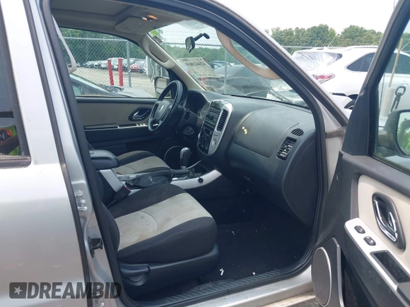 2005 Mercury Mariner Luxury z VIN 4M2CU57135DJ23718, wystawiony jako IAAI lot #42441869 z przebiegiem 179 378 mil mil oraz . Historia ofert i sprzedaży dostępna na DreamBid. Obrazek 5.