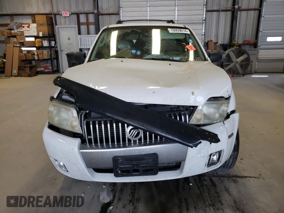 2006 Mercury Mariner Luxury with VIN 4M2CU57126KJ02968, listed as a Copart auction lot 70959614 with Not provided miles and Salvage title. Bid and sale history available at DreamBid. Image 5.