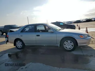 2001 Toyota Camry CE z VIN 4T1BG22K01U085409, wystawiony jako Copart lot #55941765 z przebiegiem 215 062 mil mil oraz Szkoda całkowita • Salvage title. Historia ofert i sprzedaży dostępna na DreamBid. Obrazek 4.