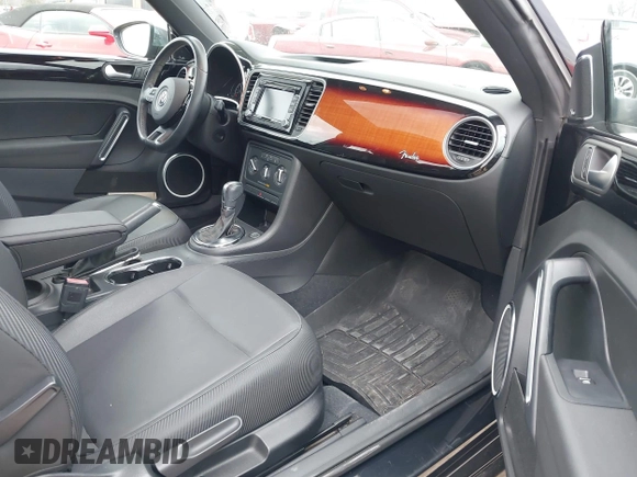 2013 Volkswagen Beetle 2.5L with VIN 3VWJP7AT8DM679548, listed as a IAAI auction lot 41459613 with 135,198 mi miles and . Bid and sale history available at DreamBid. Image 5.