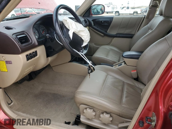 2002 Subaru Forester S w/Premium Pkg with VIN JF1SF656X2H736719, listed as a Copart auction lot 47633405 with 63,397 mi miles and Salvage Title. Bid and sale history available at carsss.com. Image 7.