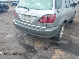 2000 Lexus RX 300 z VIN JT6GF10U3Y0060413, wystawiony jako IAAI lot #42108695 z przebiegiem 174 769 mil mil oraz . Historia ofert i sprzedaży dostępna na DreamBid. Obrazek 13.