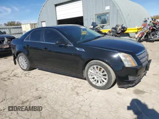 2010 Cadillac CTS with VIN 1G6DA5EG1A0133596, listed as a Copart auction lot 79690124 with 145,379 mi miles and Salvage Title. Bid and sale history available at DreamBid. Image 4.