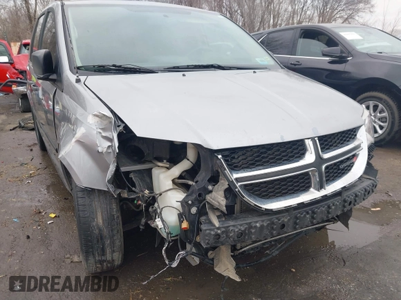 2014 Dodge Grand Caravan American Value with VIN 2C4RDGBG9ER187198, listed as a IAAI auction lot 41669334 with 204,803 mi miles and . Bid and sale history available at DreamBid. Image 6.