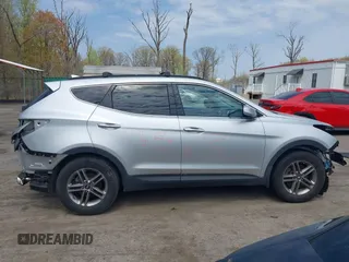2017 Hyundai Santa Fe 2.4L z VIN 5XYZUDLB6HG400828, wystawiony jako IAAI lot #42013903 z przebiegiem 88 573 mil mil oraz . Historia ofert i sprzedaży dostępna na DreamBid. Obrazek 14.