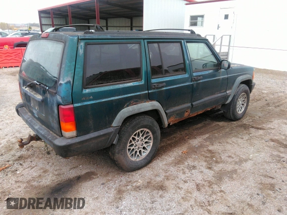 1997 Jeep Cherokee Sport with VIN 1J4FJ68S8VL500942, listed as a IAAI auction lot 40810846 with 224,782 mi miles. Bid and sale history available at carsss.com. Image 4.