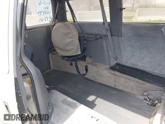 1991 Dodge Grand Caravan with VIN 1B4GK54R6MX632977, listed as a IAAI auction lot 42063934 with 130,812 mi miles and . Bid and sale history available at DreamBid. Image 8.