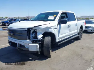 2023 Ford F-150 Lightning Pro with VIN 1FTVW1EL4PWG42578, listed as a IAAI auction lot 41992446 with 26,729 mi miles and . Bid and sale history available at DreamBid. Image 19.