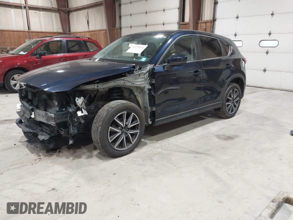 2018 Mazda CX-5 Touring with VIN JM3KFBCM5J0434716, listed as a IAAI auction lot 41738956 with 108,264 mi miles and . Bid and sale history available at DreamBid. Image 21.