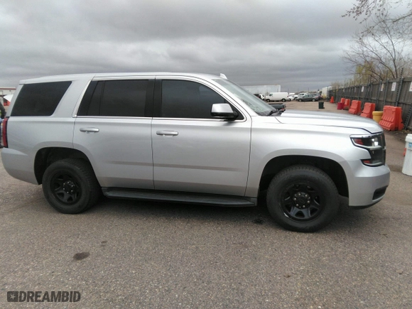 2016 Chevrolet Tahoe Commercial with VIN 1GNSKDEC5GR368328, listed as a IAAI auction lot 41975629 with 104,205 mi miles. Bid and sale history available at carsss.com. Image 13.