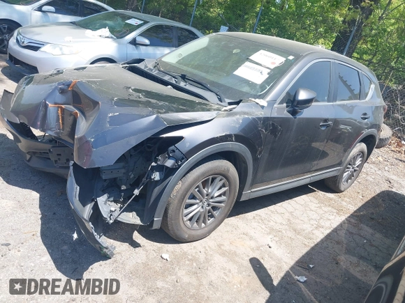 2017 Mazda CX-5 Touring with VIN JM3KFACL5H0197432, listed as a IAAI auction lot 42060117 with 1 mi miles. Bid and sale history available at carsss.com. Image 18.