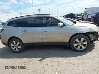 2014 Chevrolet Traverse LTZ z VIN 1GNKRJKDXEJ248849, wystawiony jako IAAI lot #41805119 z przebiegiem 171 489 mil mil oraz . Historia ofert i sprzedaży dostępna na DreamBid. Obrazek 14.