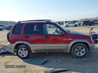 2002 Suzuki Grand Vitara JLX z VIN JS3TD62V824152943, wystawiony jako IAAI lot #41668395 z przebiegiem 104 191 mil mil oraz . Historia ofert i sprzedaży dostępna na DreamBid. Obrazek 14.