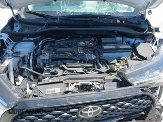 2022 Toyota Corolla Cross LE z VIN 7MUBAAAG5NV028801, wystawiony jako IAAI lot #42144175 z przebiegiem 22 715 mil mil oraz . Historia ofert i sprzedaży dostępna na DreamBid. Obrazek 10.