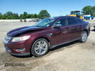 2011 Ford Taurus Limited z VIN 1FAHP2FW1BG131525, wystawiony jako Copart lot #55863135 z przebiegiem 76 511 mil mil oraz Szkoda całkowita • Salvage title. Historia ofert i sprzedaży dostępna na DreamBid. Obrazek 1.