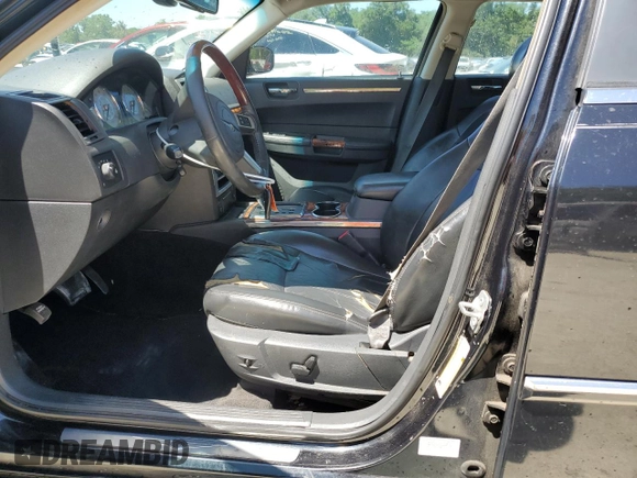 2008 Chrysler 300 C Hemi with VIN 2C3KA63H08H156142, listed as a Copart auction lot 53741595 with 216,677 mi miles and Salvage Title. Bid and sale history available at carsss.com. Image 7.