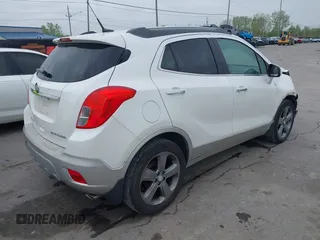 2014 Buick Encore Convenience with VIN KL4CJBSB3EB750986, listed as a IAAI auction lot 42195394 with 67,017 mi miles and . Bid and sale history available at DreamBid. Image 4.