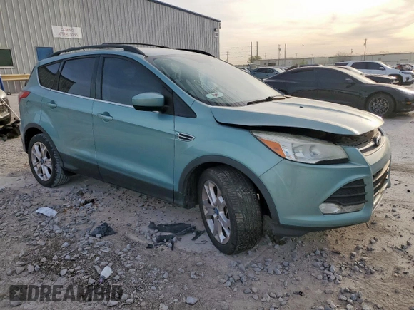 2013 Ford Escape SE with VIN 1FMCU0G97DUC34491, listed as a Copart auction lot 50516525 with 133,764 mi miles and Salvage title. Bid and sale history available at DreamBid. Image 4.