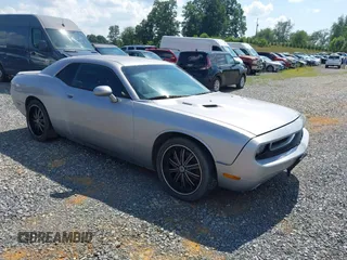 2014 Dodge Challenger R/T with VIN 2C3CDYBT3EH105288, listed as a IAAI auction lot 42726578 with 165,520 mi miles and . Bid and sale history available at DreamBid. Image 1.