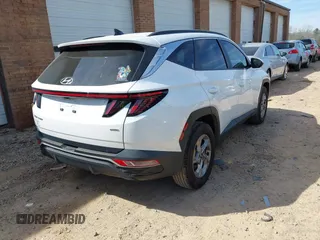 2023 Hyundai Tucson SEL with VIN 5NMJBCAE2PH190887, listed as a IAAI auction lot 41800623 with 32,187 mi miles and . Bid and sale history available at DreamBid. Image 4.