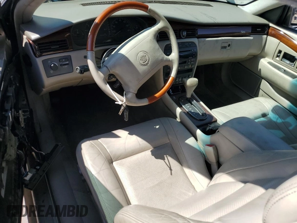 2002 Cadillac Eldorado Touring ETC z VIN 1G6ET12952B101866, wystawiony jako Copart lot #57365965 z przebiegiem Nie podano mil oraz Tytuł czysty. Historia ofert i sprzedaży dostępna na DreamBid. Obrazek 8.