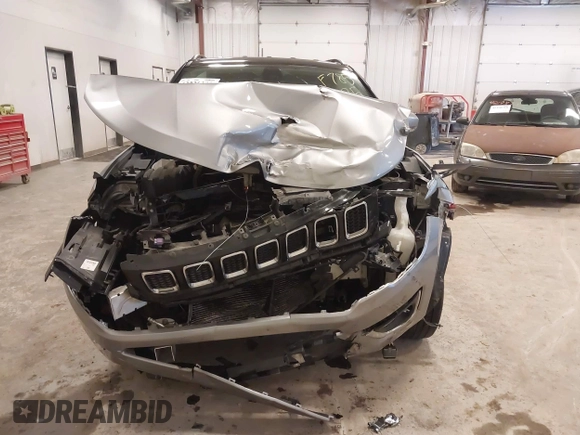 2019 Jeep Compass Limited with VIN 3C4NJDCB0KT656468, listed as a IAAI auction lot 42221300 with 105,115 mi miles and . Bid and sale history available at DreamBid. Image 12.