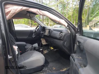 2022 Toyota Tacoma SR with VIN 3TYAX5GN1NT042099, listed as a IAAI auction lot 42081791 with 38,621 mi miles and . Bid and sale history available at DreamBid. Image 5.