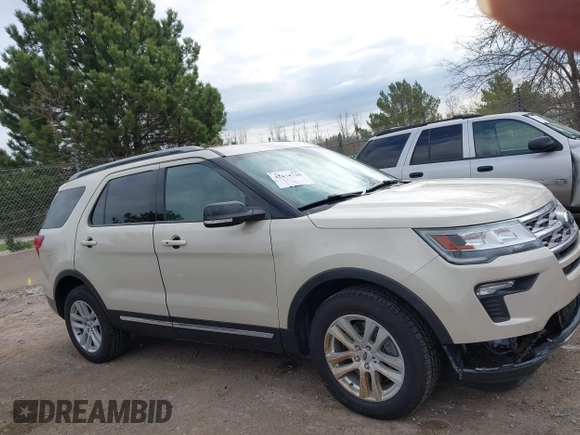 2018 Ford Explorer XLT z VIN 1FM5K8D8XJGB48238, wystawiony jako IAAI lot #42134728 z przebiegiem 88 434 mil mil oraz . Historia ofert i sprzedaży dostępna na DreamBid. Obrazek 13.